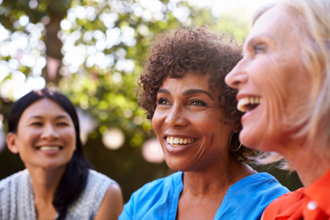 3 women smiling